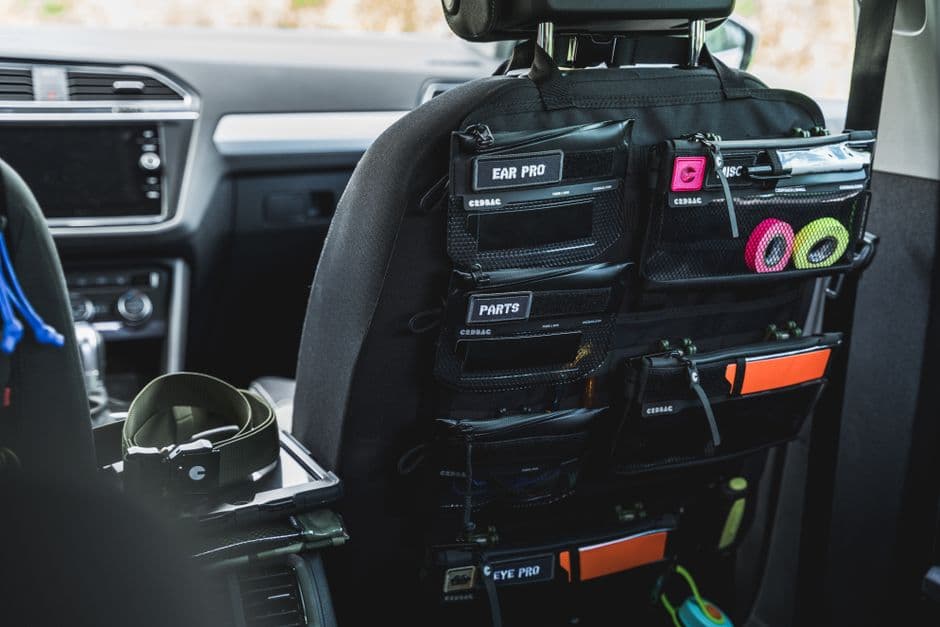 The back of a car front seat with a hanging organizer fitted