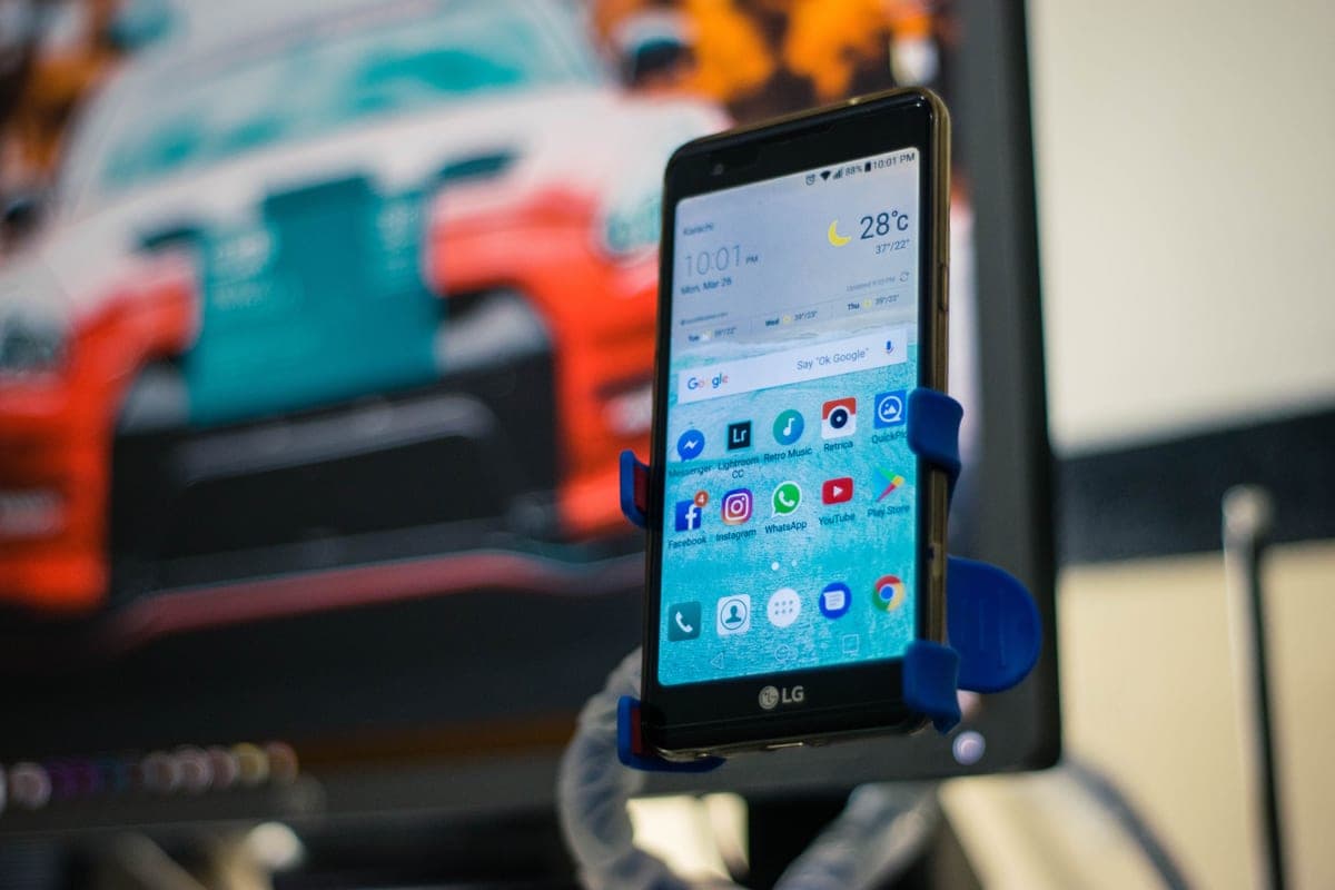 An Android phone screen showing a navigation map in a car