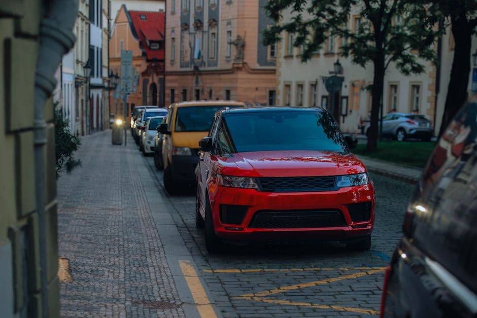 Cars parked along a busy city street