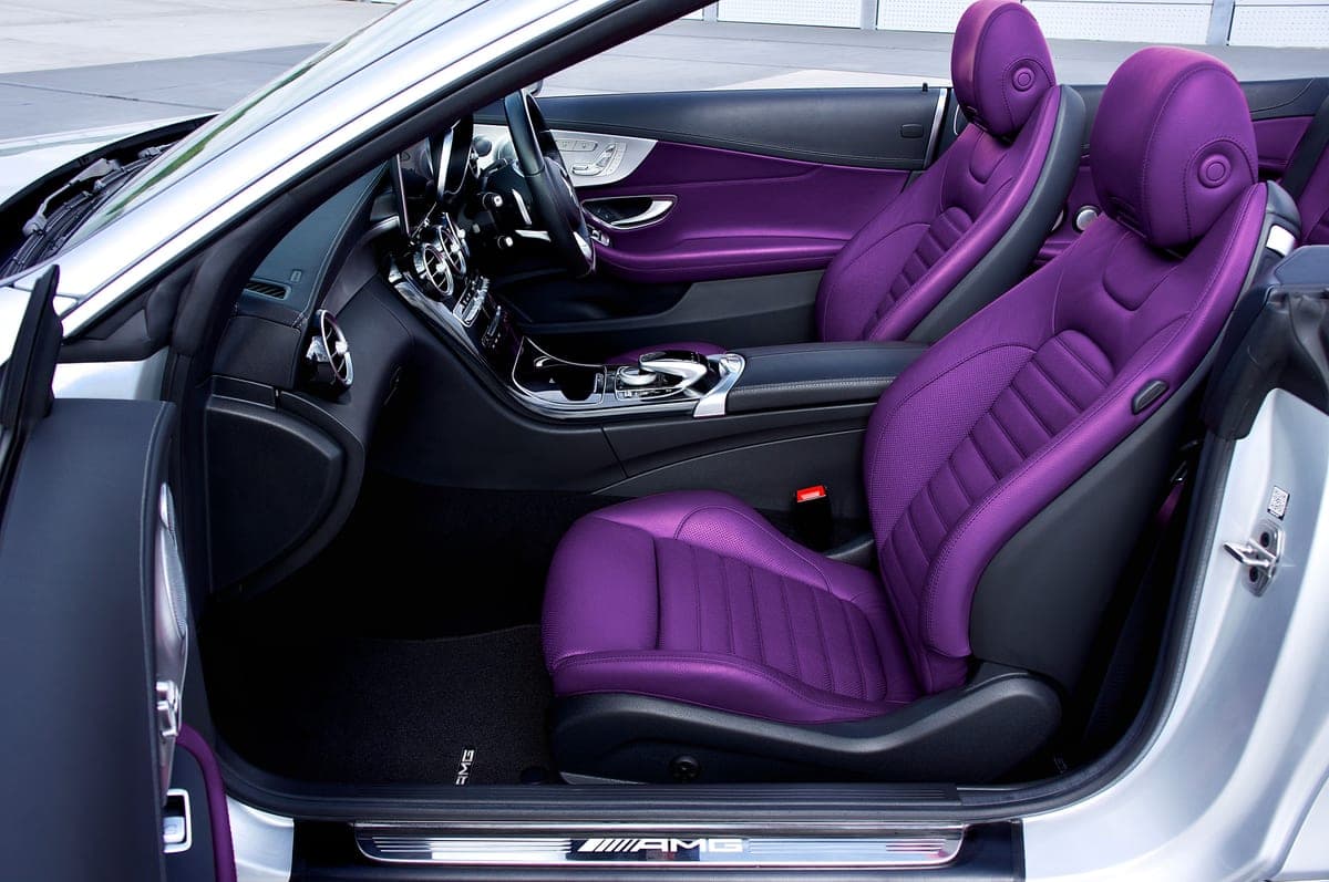 The fabric texture of a car seat photographed close up