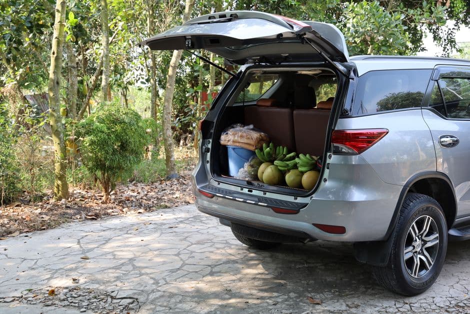The open cargo area of an estate car with the rear seats folded