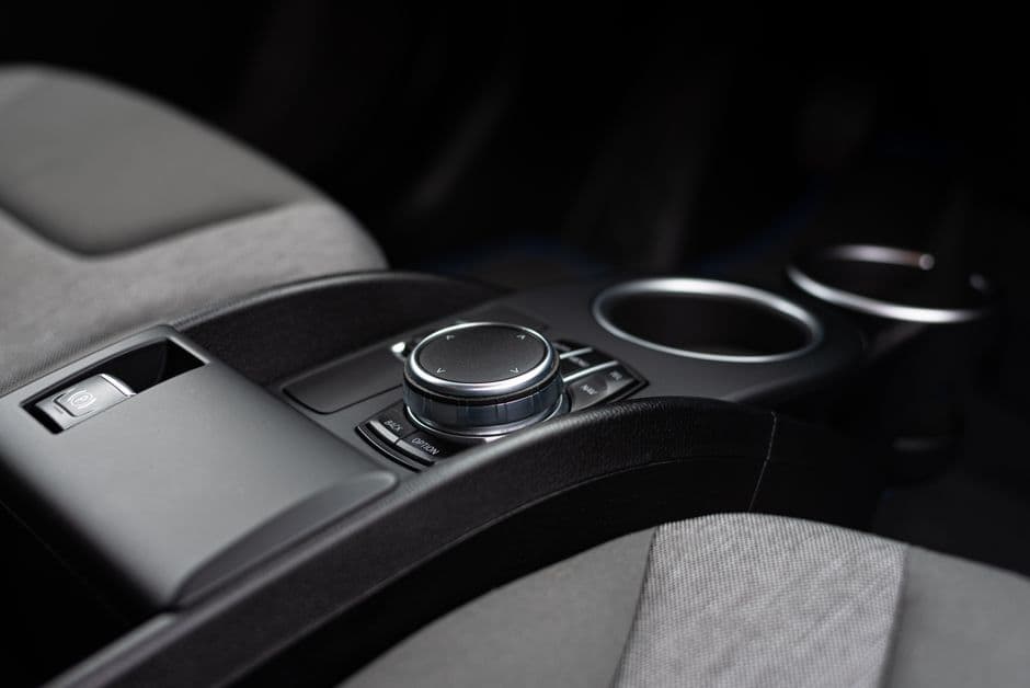 Cup holders in a car center console