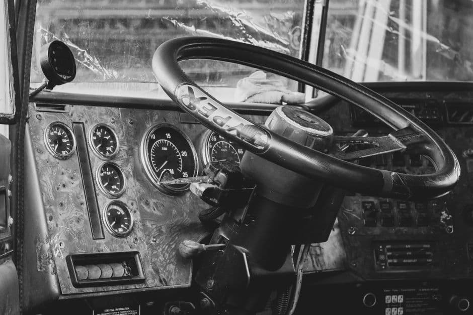 The interior of a pickup truck showing the dashboard and steering wheel
