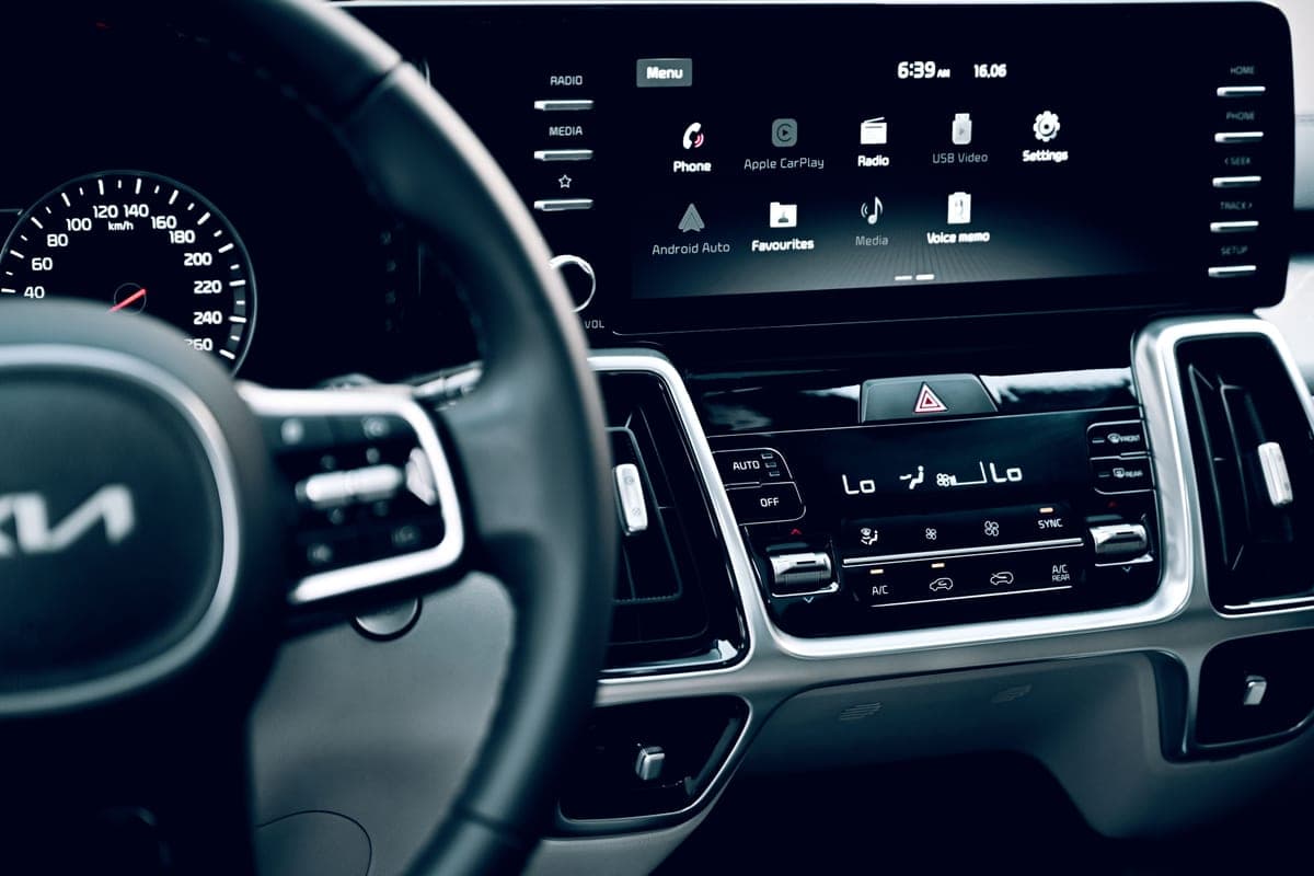 A car dashboard screen displaying the Apple CarPlay interface
