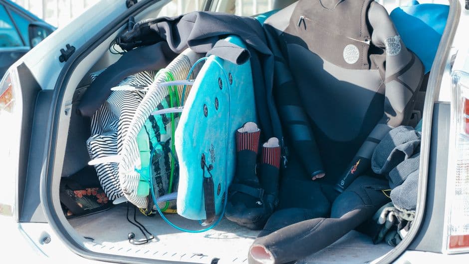 An open car trunk with equipment stored inside