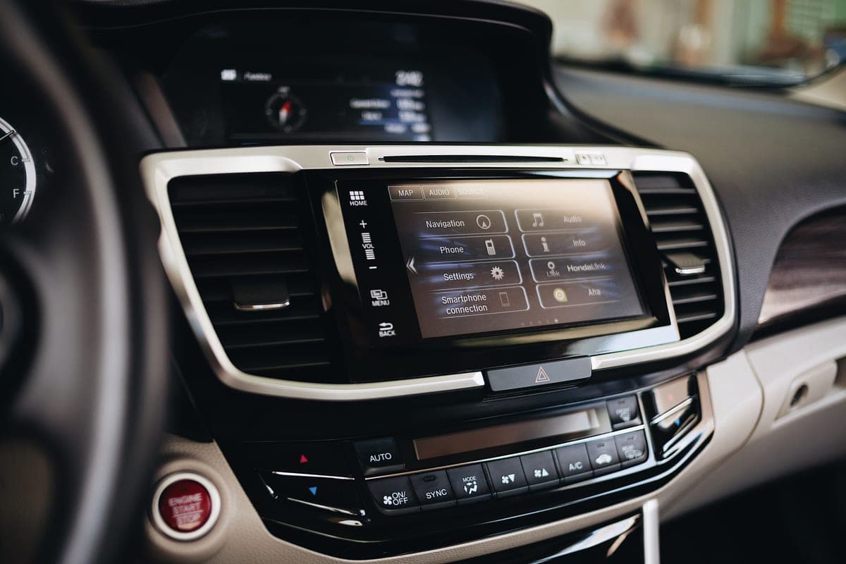 A car's touchscreen infotainment display showing a navigation map